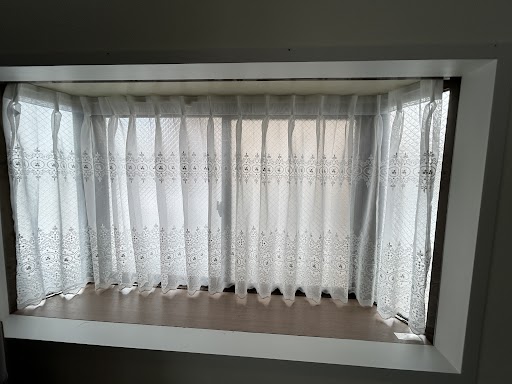 出窓 カーブレール